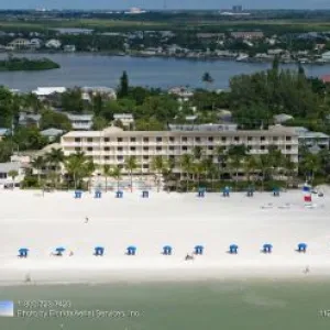 a large body of water with a city in the background
