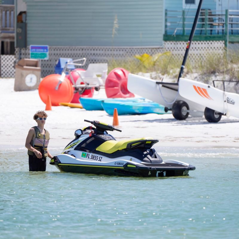 a man in the water with a jetski