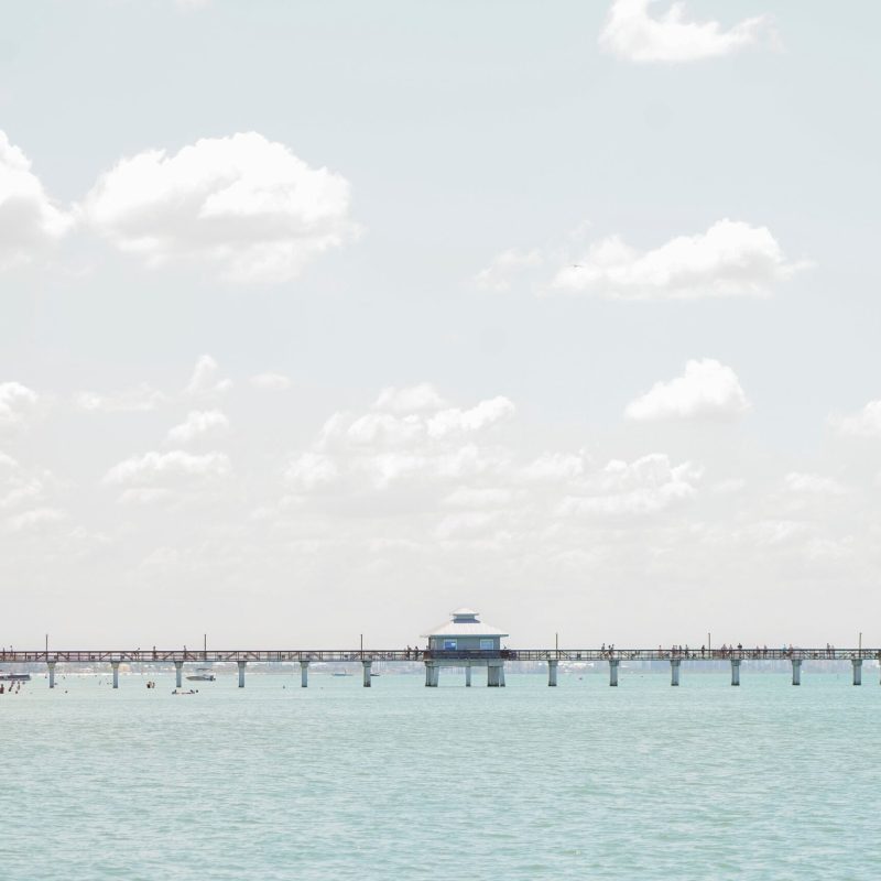 a large body of water with a bridge